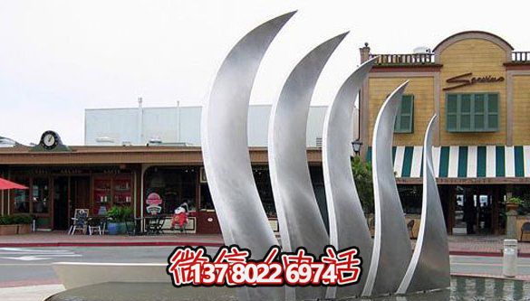 抽象不銹鋼翅膀雕塑將庭院與創(chuàng)意完美結(jié)合